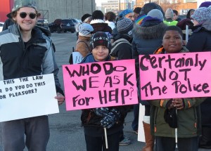 Brainwashed kids holding BlackLivesMatter signs